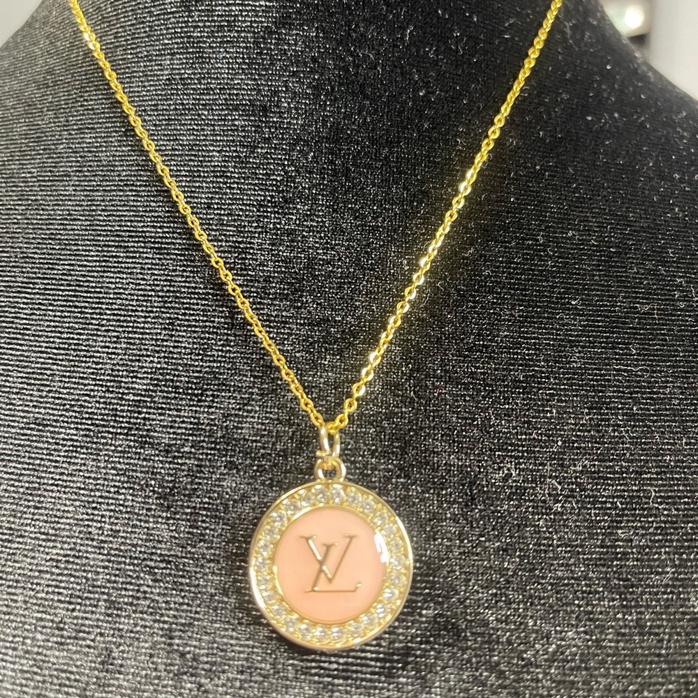 Louis Vuitton zipper pull - authentic- on 18” sterling silver chain